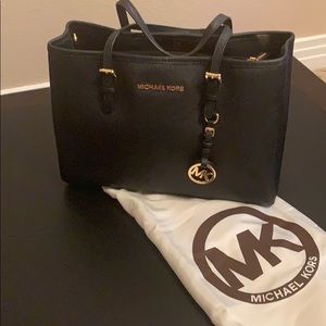 Michael Kors black purse.